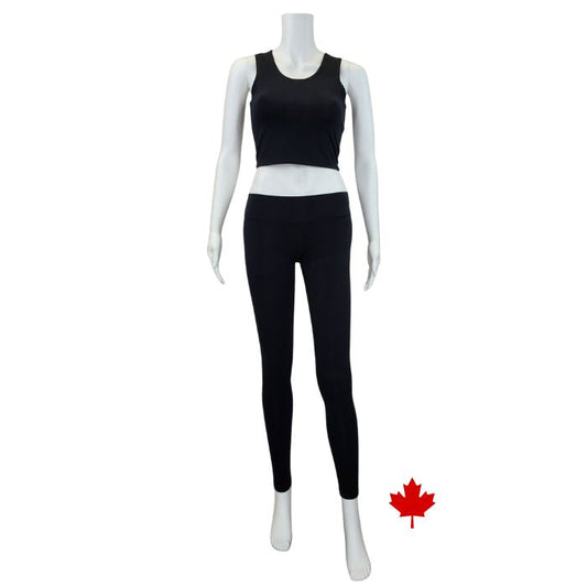 white mannequin wearing black eve full length leggings and black stephanie crop tank top front view on white background