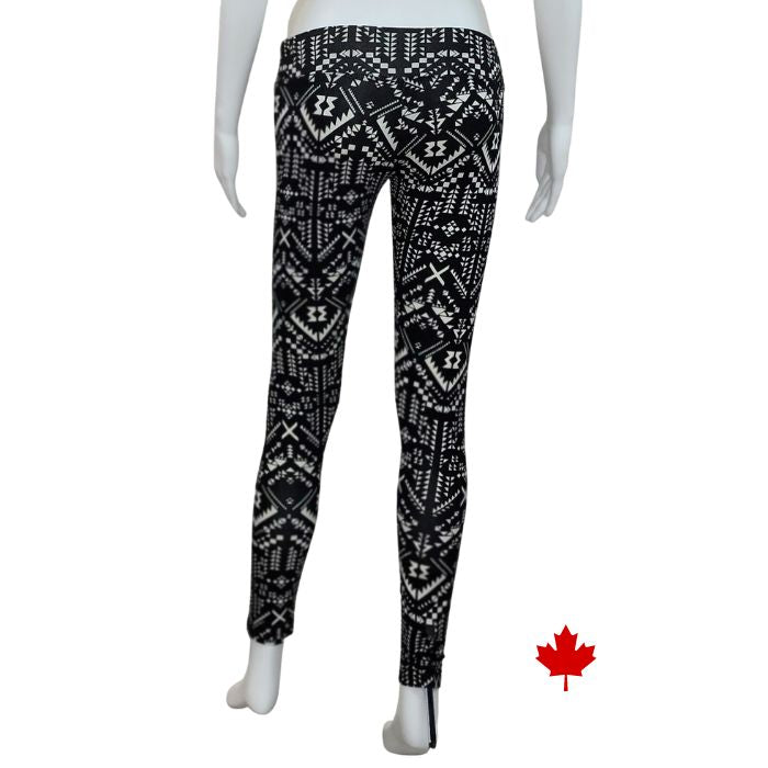 bottom of white mannequin wearing geometric print eve yoga full length leggings back view on white background