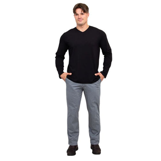 male model wearing black adam long sleeve shirt and grey pants front view on white background