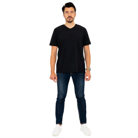 male model wearing black adam short sleeve shirt and blue jeans front view on white background