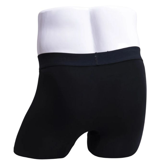 body of white male mannequin wearing black boxer 2.0 boxer brief undershorts back view on white background
