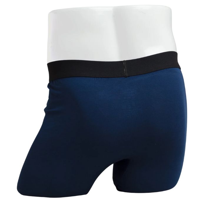 body of white male mannequin wearing indigo blue boxer 2.0 boxer brief undershorts back view on white background