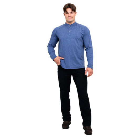 male model wearing denim blue brody long sleeve shenley shirt and black pants front view on white background