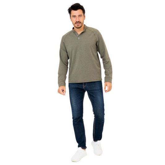 male model wearing khaki green brody long sleeve shenley shirt and blue jeans front view on white background