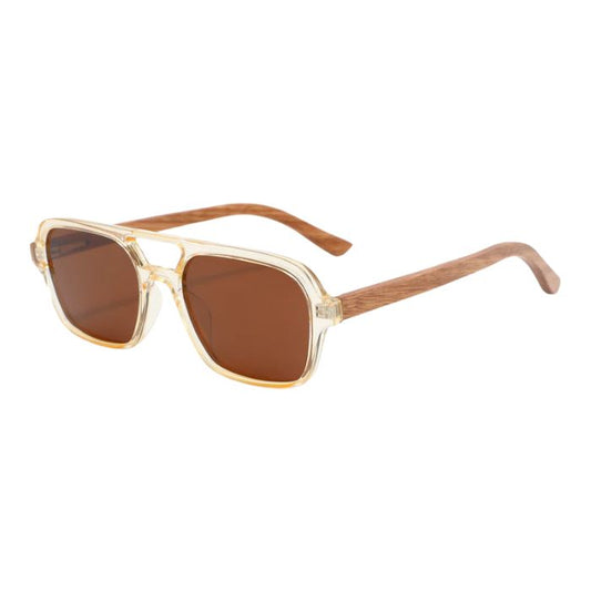 copenhagen sunglasses yellow frames brown lenses over view of sunglasses on white background