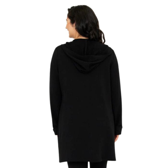 a woman wearing black cortes jacket waist up back view set on a studio white background
