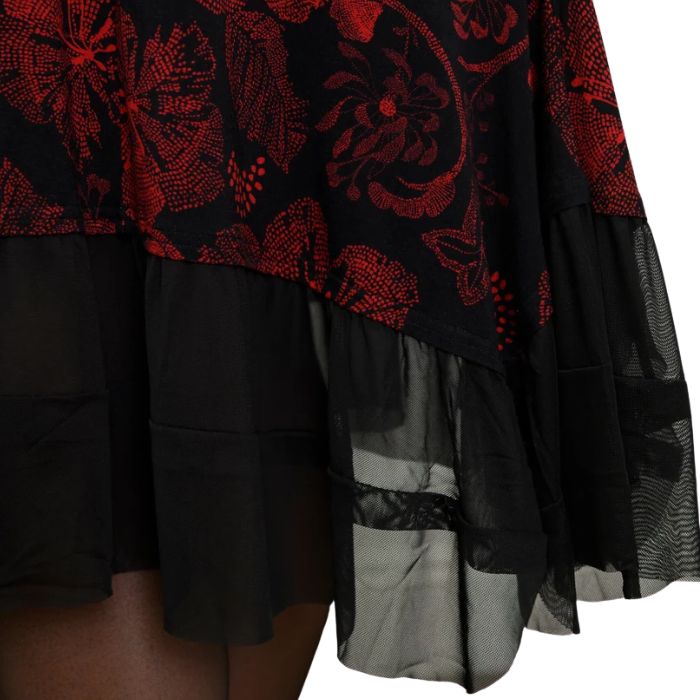floral trace print danube dress close-up view of skirt hemline set on a white background