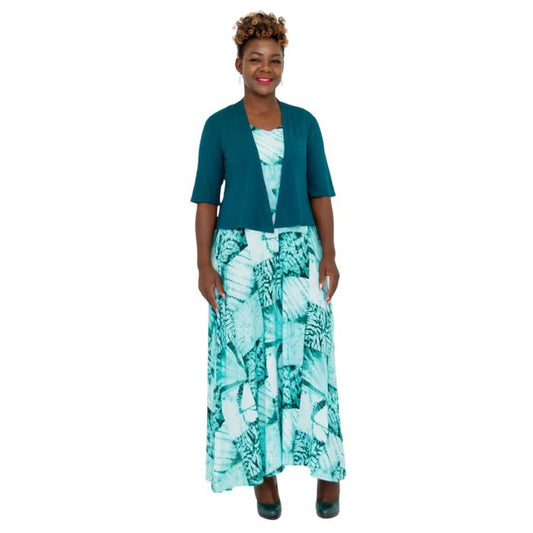 female model wearing teal green doda jacket and print maxi dress front view on white background