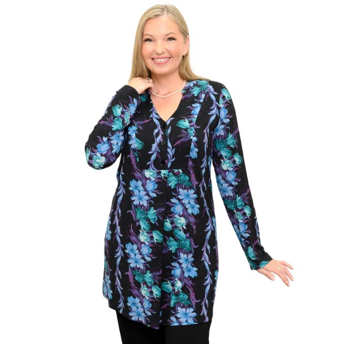 a woman wearing blue hour print edwina tunic waist up front view set on a studio white background