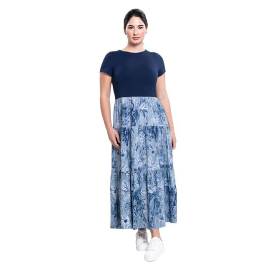 female model wearing indigo escape print erin dress front view on white background
