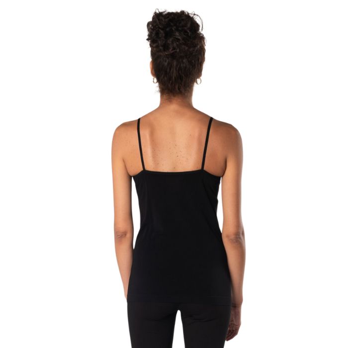 top of female model wearing black essential cami tank top back view on white background