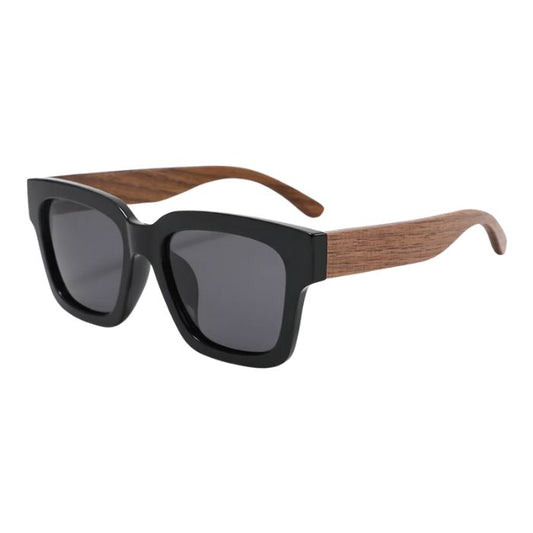 gorgona sunglasses black frames and black lenses over view of sunglasses on white background