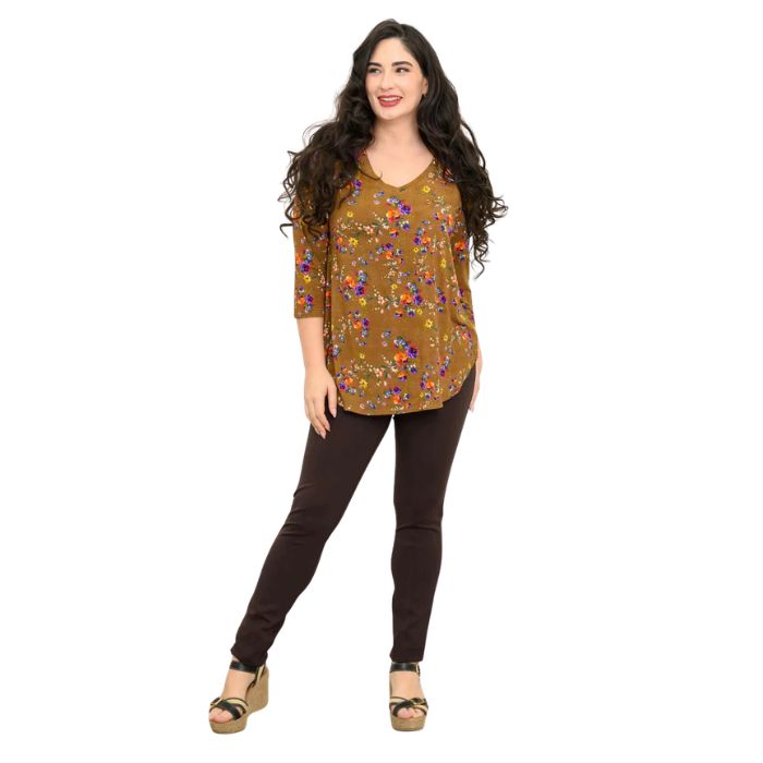 female model wearing sand pansy print jackie top and coffee brown nadia pants front view on white backround