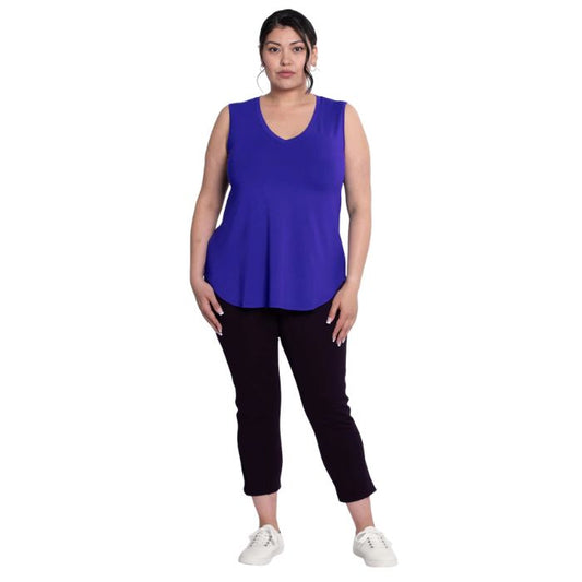 female model wearing violet purple jackie tank top and black susan capri pants front view on white backround