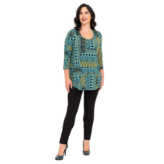 female model wearing jazz teal ways print three quarter sleeve top and black nadia pants front view on white background