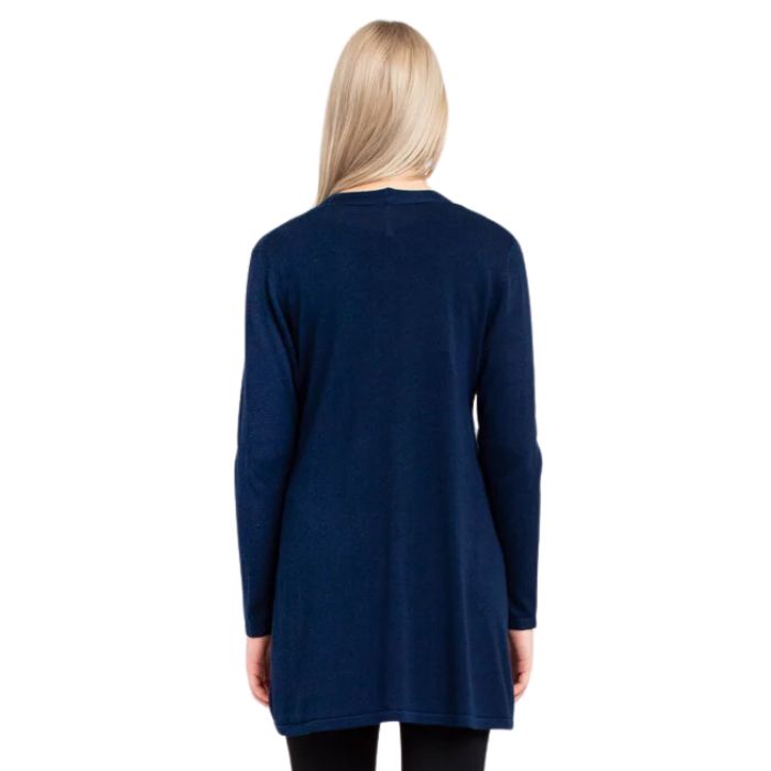 female model wearing indigo blue justine draped cardigan sweater back view on white background