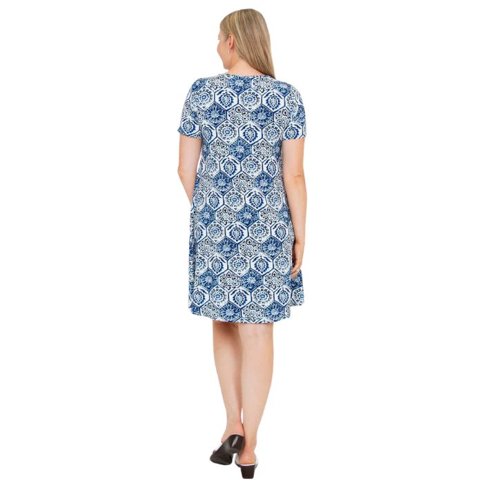 woman wearing zesty print lanai dress front view set on a white background