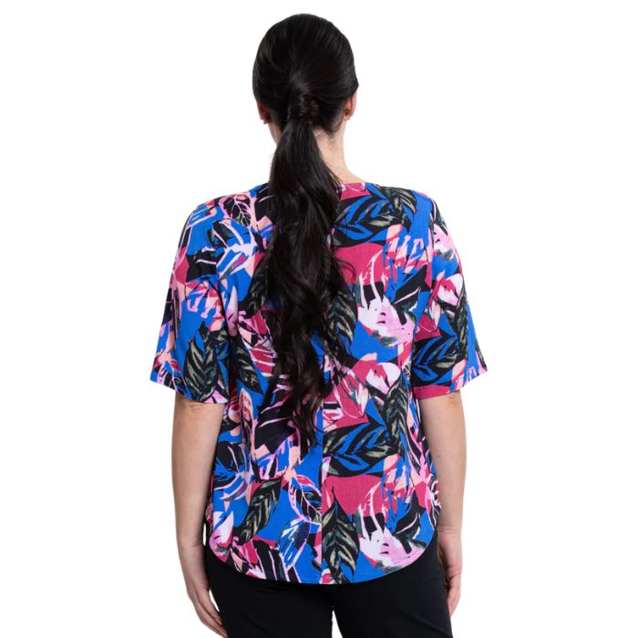 female model wearing pink bonita print liza top back view on white background