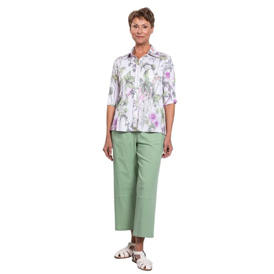 model wearing khaki clover print lorine blouse and sage green boardwalk capri pants front view on whitte background