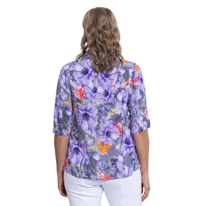 model wearing violet bloom print lorine blouse back view on whitte background
