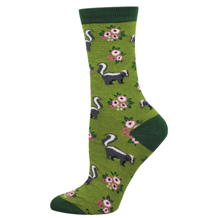 green crew sock with flowers and skunks print on white background