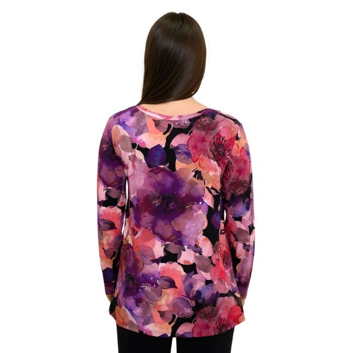 a woman wearing royale garden print margie top waist up back view set on a studio white background