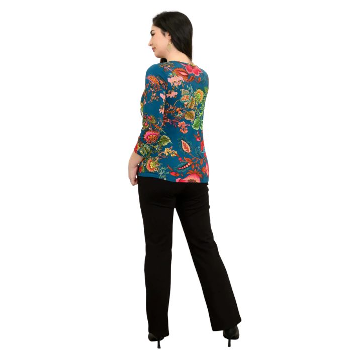 female model wearing teal fantasy print margorie three quarter sleeve top and black daya pants back view on white background