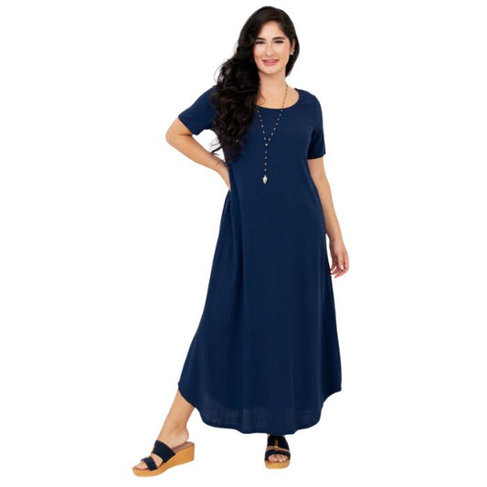 female model wearing indigo blue martha dress front view on white background