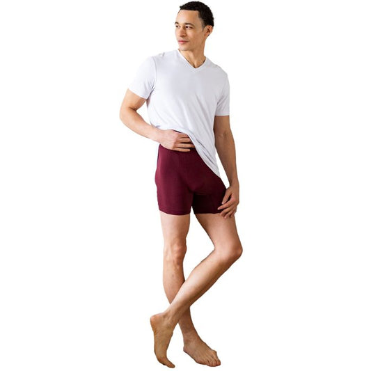 male model wearing maroon red boxer briefs and white huron v-neck tee front view on white background