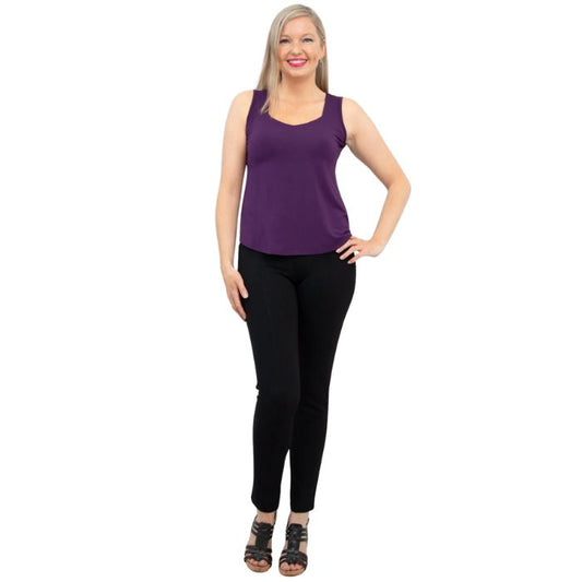 female model wearing royale purple ritzy tank top and black nadia pants front view on white background