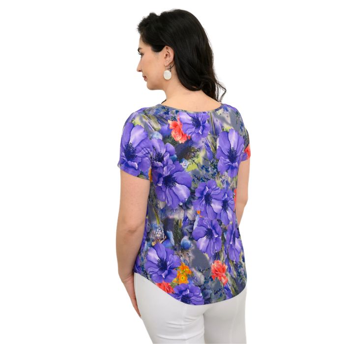 female model wearing violet bloom print ritzy top back view on white background