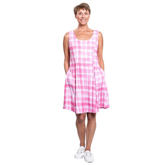 female model wearing pink plaid print sara dress front view on white background