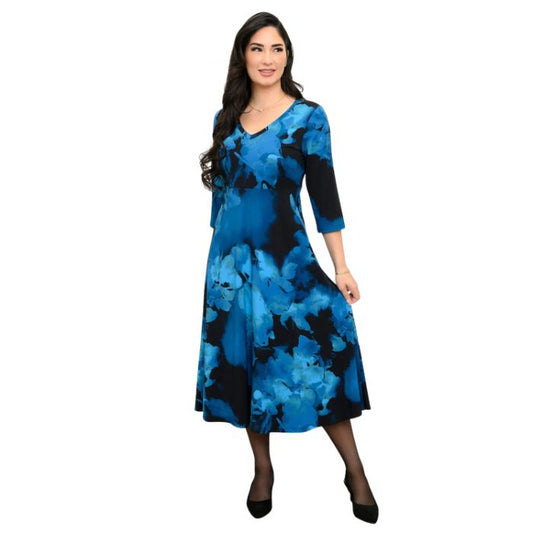woman wearing blue space print soul dress front view set on a white background