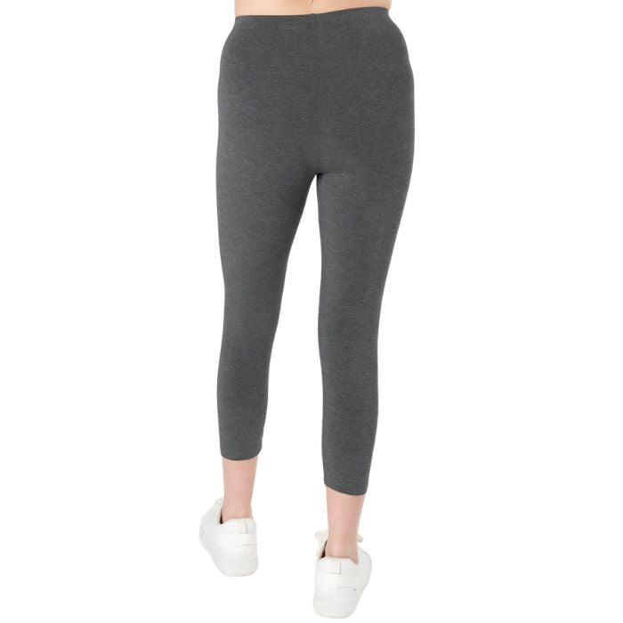female model wearing charcoal grey suri capri length leggings back view on white background