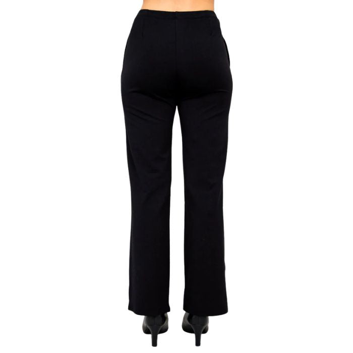 female model wearing black susan pants back view on white background