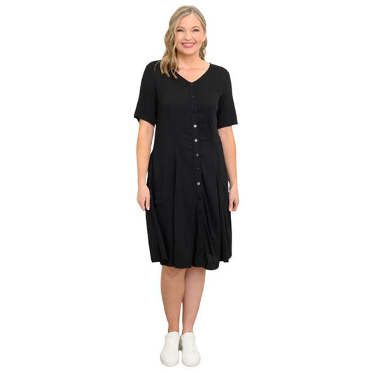 female model wearing black teresa dress front view on white background