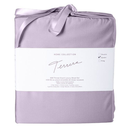 Amethyst purple bamboo fabric bag containg sheet set- flat sheet, fitted sheet and two pillowcases on white background