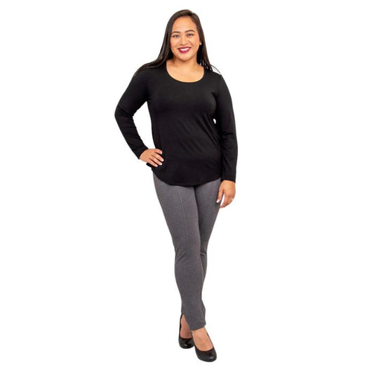 female model wearing tessa long sleeve top black and nadia granite grey pants front view on white background