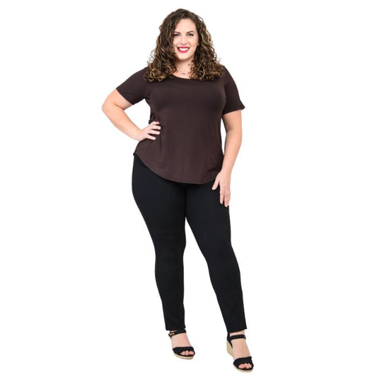 female model wearing coffee brown tessa tee and black nadia pants front view on white background