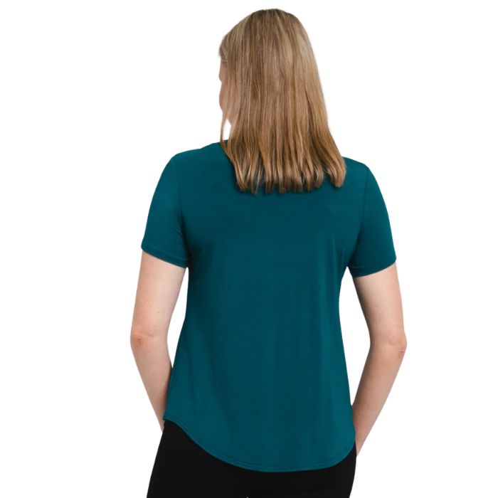female model wearing teal green tessa tee back view on white background