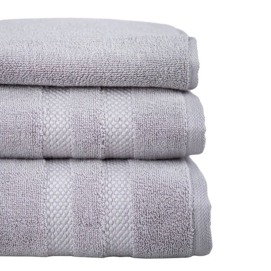 stacked grey three piece towel set side view on white background