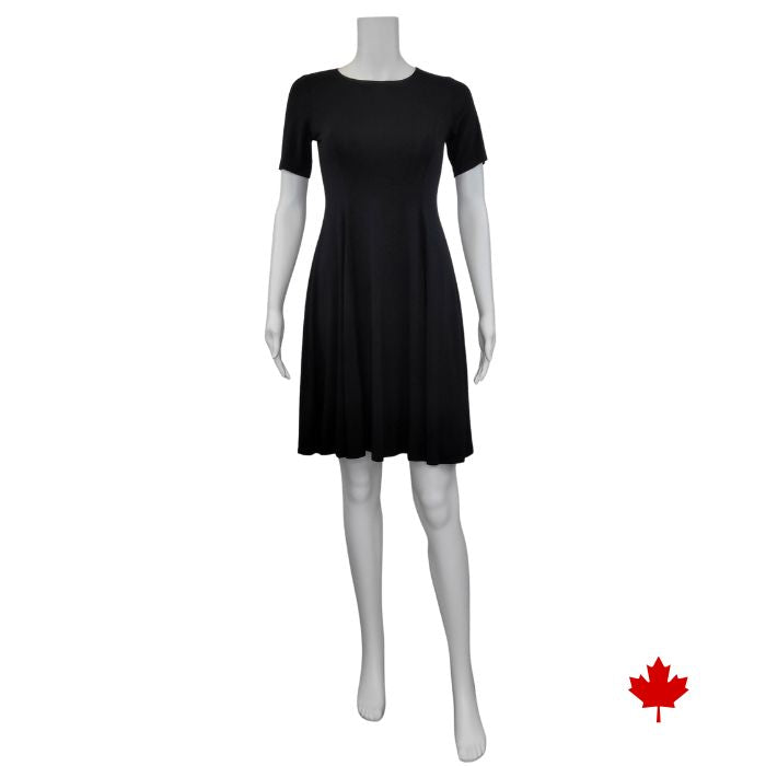 mannequin wearing black twirl dress front view on white background