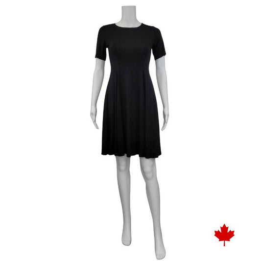 mannequin wearing black twirl dress front view on white background