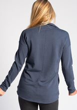 For any occasion lounging or outdoor hikes, the Naomi Half-Zip Sweater will ensure that you stay warm and cozy. It's made with our earth-friendly bamboo fleece that provides natural insulation to the body. The relaxed shoulder and curved hemline make this sweater ultra-flattering and non-bulky.  Fabrication: 66% Viscose from bamboo, 28% Cotton, 6% Spandex TERRERA $110.00 colour anchor blue