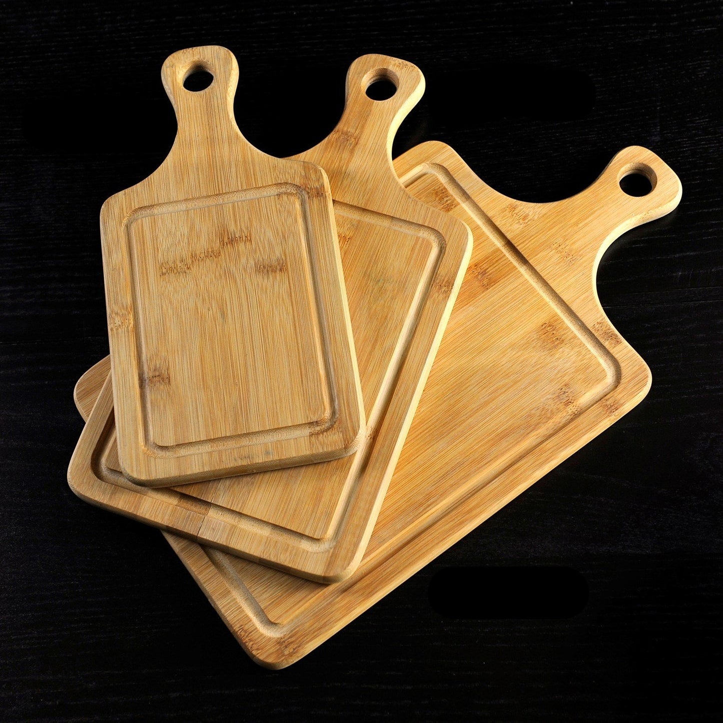 Made with Bamboo the Ridged Cutting Board comes in three sizes and has a ridge around the outside. Great for catching crumbs Small - 12" x 6" $15.00 Medium - 14" x 8" $20.00 Large - 16" x 9" $25.00 VERDICI