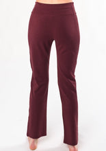 The Emory Pant looks sophisticated yet it feels comfortable enough to lounge in! Made with structured and soft brushed french terry fabric; so these pants can take you from work trips to weekend road trips.   Fabrication: 67% Viscose from Bamboo, 29% Cotton, 4% Spandex wine red $95.00