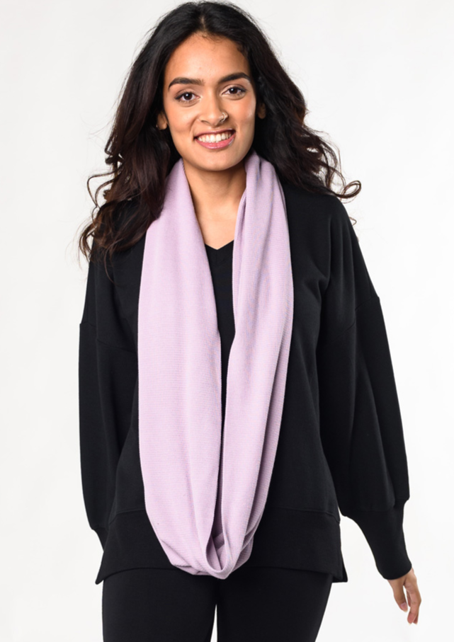 The Terrera Infinity Scarf in Anchor Blue is a plush and cozy sustainable waffle scarf. It is a compliment to all your layering needs.  Fabrication: 68% Viscose from bamboo, 28% cotton 4% Spandex  $35.00 colour lilac purple