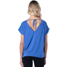 top of female model wearing ocean blue alicia v-neck top back view on white background