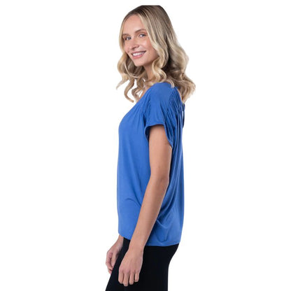 top of female model wearing ocean blue alicia v-neck top side view on white background