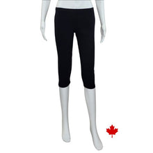 bottom of white mannequin wearing black elle 3/4 length leggings front view on white background